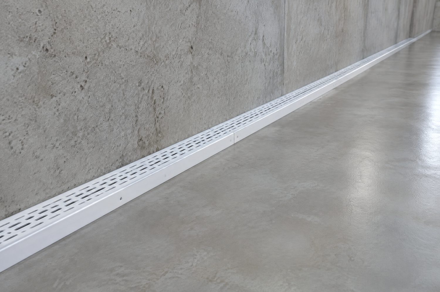 Interior basement drainage channel and sump system in a Charlotte, NC home